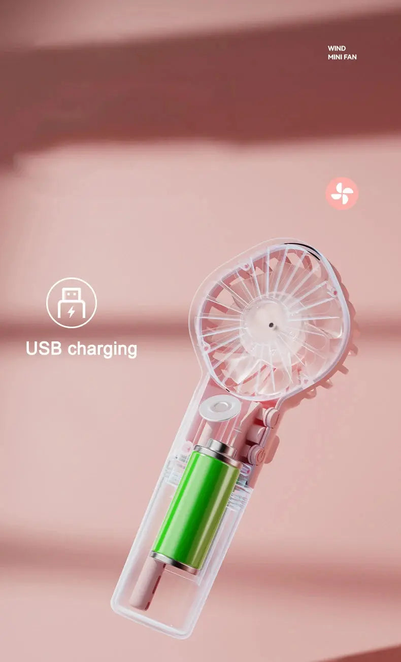 Mini fan with charging cable and spray. True Value
