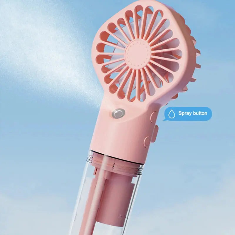 Mini fan with charging cable and spray. True Value