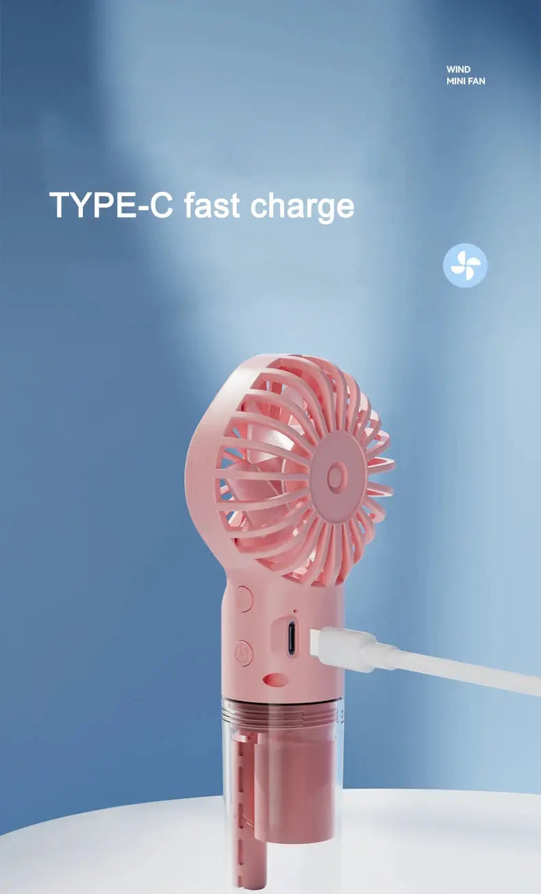 Mini fan with charging cable and spray. True Value